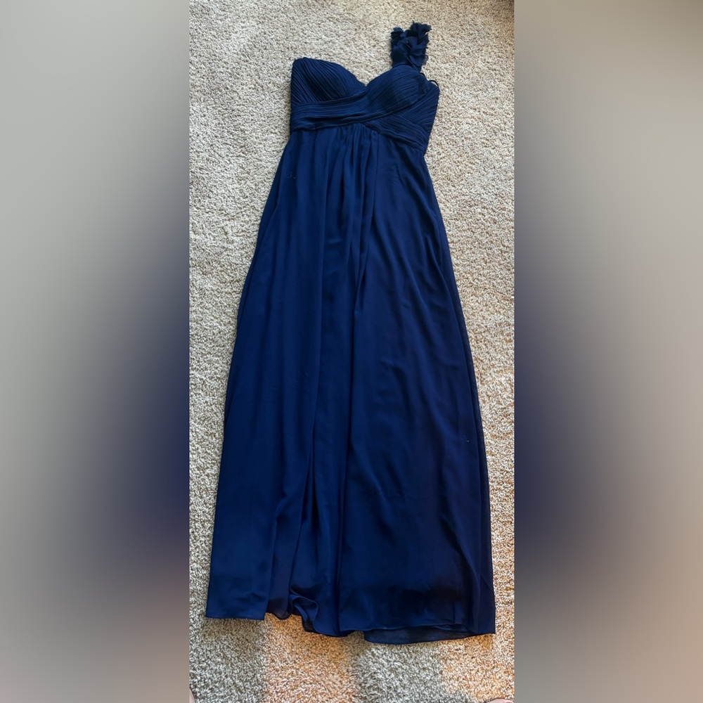 “Ever Pretty” blue dress that goes down to the ankles. It’s been worn twice.